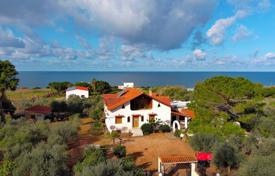 Two-storey villa with a guest house and a large plot near the sea in the Peloponnese, Greece for 260,000 €