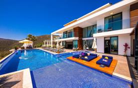 Modern villa with a garden, a swimming pool and a picturesque view close to the sea, Kalkan, Turkey for 9,700 € per week