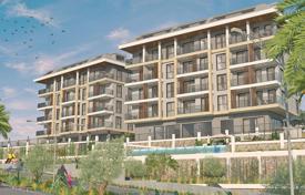 Modern apartment in a new residence with a swimming pool, a garden and a gym, Oba, Turkey for $131,000