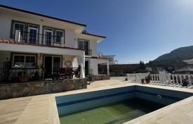 Villa in Uzumlu among mountains and forests, 20 km from Fethiye, with heating, pool, 4 balconies, fireplace, barbecue, parking, surveillance for $362,000