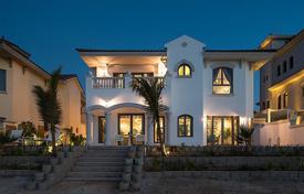 Beautiful villa with a swimming pool and a garden on the first sea line, Palma Jumeirah, Dubai, UAE for $14,700 per week