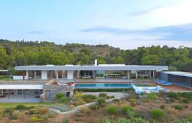 Modern villa with a swimming pool directly on the beach, Porto Heli, Greece for 40,000 € per week