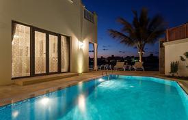 Classical villa with a swimming pool and a direct access to the beach, Dubai, UAE for $11,200 per week