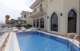 Modern villa with a swimming pool and a private beach in the prestigious area of Palm Jumeirah, Dubai, UAE for $23,400 per week