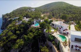 Mediterranean villa with a swimming pool on the first line from the sea, Santa Eulalia, Ibiza, Spain for 15,000 € per week