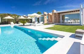 New villa with a sea view, on a plot with a large pool, lounge areas and a parking, near Cala Conta beach, San Jose, Ibiza, Spain for 14,000 € per week