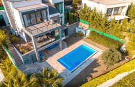 Villa in Yalikavak, 150 m from the sea, 4 km from marina, with swimming pool and a bar, gym, solar panels, parking, video surveillance for $1,305,000