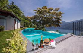 Modern villa with panoramic views of Lake Como, Lario, Lombardy, Italy for 7,200 € per week