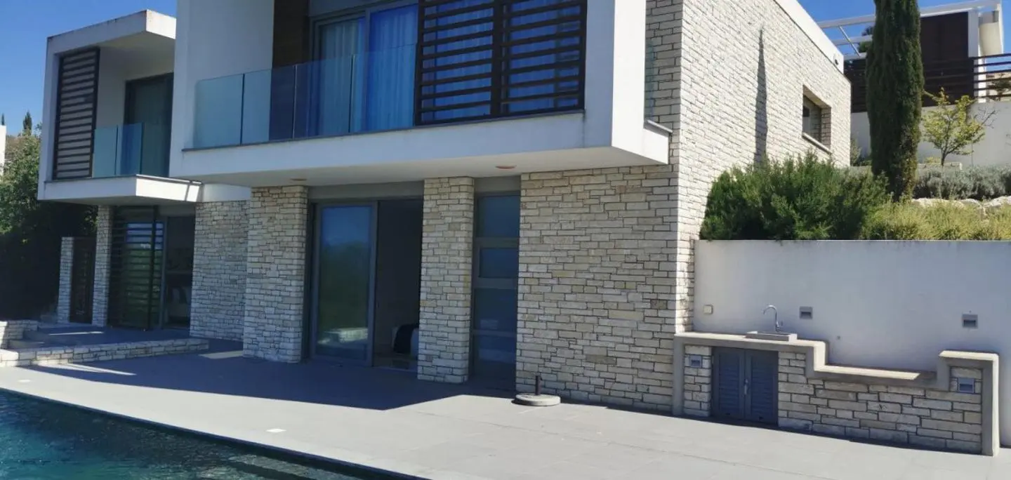 Furnished villa with a garden in a residence with a golf course, Tsada