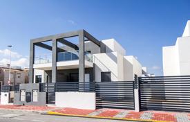 Property for sale in Alicante. Modern townhouse in a residential complex with a communal pool and a garden, near the beach, Aguas Nuevas, Spain Property for sale in Alicante. Modern townhouse in a residential complex with a communal pool and a garden, near the beach, Aguas Nuevas, Spain