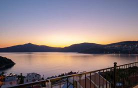 Modern 3-storey panoramic sea-view villa in Kalkan, 100 m from the sea, with 4 balconies, 3 hot tubs and a garage for $917,000
