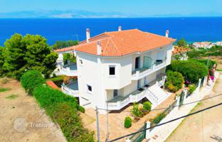 Two semi-detached houses with a sea view, a garden, a parking and a BBQ area in Xylokastro, Peloponnese, Greece for 560,000 €