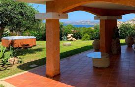 Furnished villa with a garden in a guarded residence, Palau, Italy. Price on request
