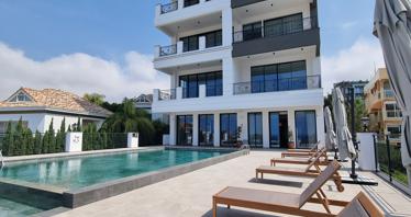 Residence with a swimming pool and an underground parking in front of the beach and the marina, Limassol, Cyprus
