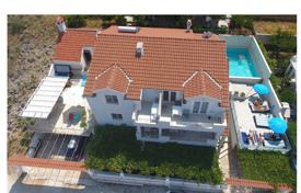 Three-storey furnished house with six apartments at 100 meters from the sea, Mastrinka, Croatia for 550,000 €