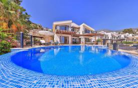 Beautiful villa with a swimming pool and a panoramic view at 50 meters from the sea, in the center of Kalkan, Turkey for $7,100 per week