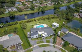 Cozy villa with a backyard, a pool, a barbecue area, a patio and a terrace, Miami, USA for 1,386,000 €