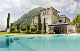 Classic four-level villa overlooking Lake Como and the mountains in Argegno, Lombardy, Italy for 16,000 € per week