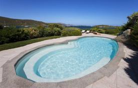 Classical beachfront villa with a swimming pool, a berth and a direct access to the beach, Porto Rotondo, Italy. Price on request