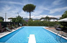 Beautiful new villa with a large garden and a swimming pool at 750 meters from the sea, Forte dei Marmi, Italy. Price on request