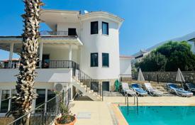Villa in Oludeniz (3 km from the beach and 7 km from Fethiye) with a private parking, swimming pool, garden bar, kitchenette and a barbecue for $443,000