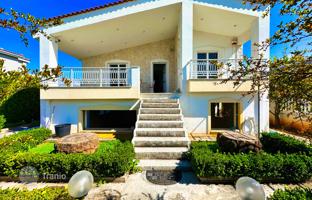 Three-storey house with a garden and parking 150 m from the sea, Vrachati, Corinthia, Greece for 400,000 €