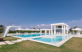 Luxury villa with 6 double specious rooms overlooks at the endless blue waters of Toroneos Gulf for $4,075,000