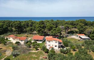 Four houses on a large plot just 100 m from the sea in Peloponnese, Greece for 850,000 €