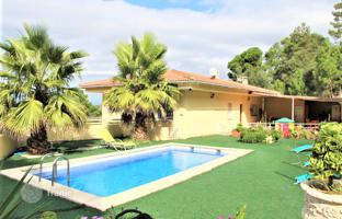 Two-storey villa with a swimming pool, a garden and two independent apartments near the beach and the center of Lloret de Mar, Spain for 426,000 €