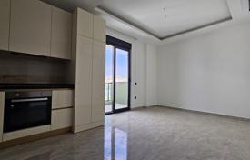 Upper-Floor One-Bedroom Apartment with Two Balconies and Sea Glimpses in Alanya Demirtaş for $160,000