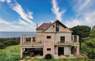 Unfinished house with a huge plot just 150 meters from the sea in the Peloponnese, Greece for 550,000 €