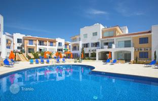Complex of townhouses with a swimming pool and a green area close to sandy beaches, Paphos, Cyprus for From 199,000 €