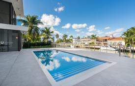Modern villa with a backyard, a swimming pool, a seating area, a terrace and a garage, Miami Beach, USA for $4,846,000