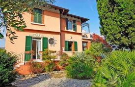 Furnished villa with a garden, a garage, a terrace and a lake view, Salo, Italy. Price on request