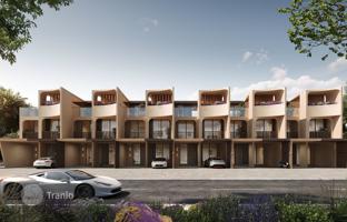 New complex of townhouses Kensington Gardens with a private school and lagoons, International City Phase 2, Dubai, UAE for From $889,000