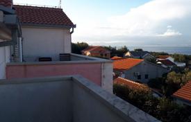 Two-bedroom apartment with a terrace and gardens, 200 meters from the sea, Supetar, Croatia for 220,000 €