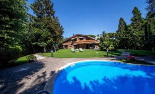 Stylish three-level villa with a pool and a guest house in Rome, Italy for 1,295,000 €