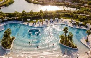 Modern apartment on a high floor in the new residence Golf Gate 2 with swimming pools and a golf club, Damac Hills, Dubai, UAE for $477,000