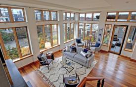Duplex penthouse with a fireplace and private deck overlooking the Jamison Square, Portland, Oregon, USA for $1,725,000