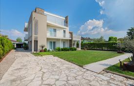Three-level modern villa with a garden, a parking and lake views in Peschiera del Garda, Italy for 1,900,000 €