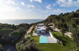 Stylish villa with a veranda, sea and hills views, a pool and a large plot, near the beach, Punta Ala, Italy for 8,800 € per week