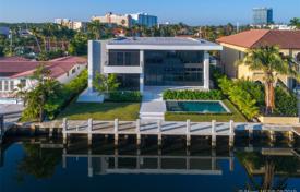 Modern villa with a backyard, a swimming pool, a relaxation area, a terrace and a garage, Miami Beach, USA for $3,995,000