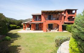 Two-level townhouse with balconies and a garden in a prestigious gated residence with a pool, near a yacht club and a beach, Porto Cervo. Price on request
