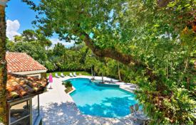 Spacious villa with a garden, a backyard, a pool, a relaxation area, a terrace and a garage, Miami, USA for $2,350,000