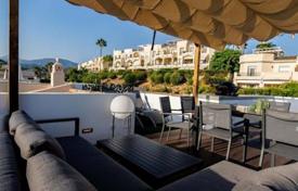Stunning penthouse with designer renovation, large terrace and mountain views in Benahavis, Andalusia, Spain. Price on request
