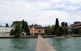 Renovated villa with a swimming pool and a berth on the first line from the lake, Sirmione, Brescia, Italy. Price on request