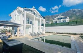 Villa in Ovacik (7 km from Fethiye and 4 km from Oludeniz beach and Blue Lagoon) with a swimming pool, large garden, roof terrace for $472,000