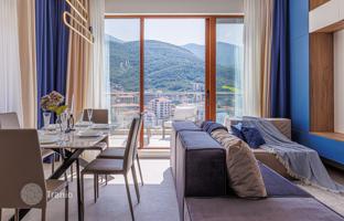 Premium apartment with a side sea view in a complex with a swimming pool, Becici, Montenegro for 385,000 €