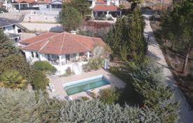 Secluded villa with a pool in Uzumlu (25 km from Fethiye), with heating, a fireplace and parking for 2 cars for $334,000
