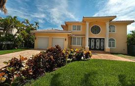 Family villa with a plot, a swimming pool, a garage and a terrace, Golden Beach, USA for $2,999,000